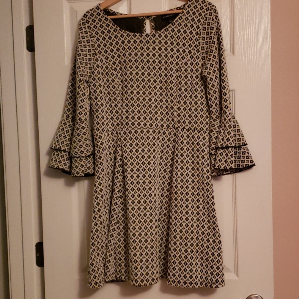 My Michelle cream and black dress.
